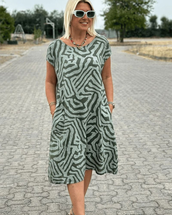 Elia - Summer dress with a round neck and a beautiful print