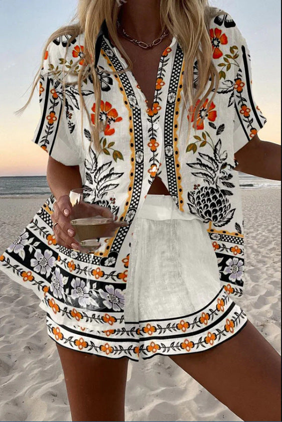 Irella | Short linen overall with floral print
