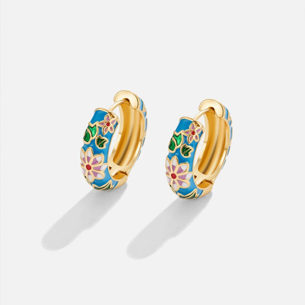 Golden hoop earrings with flower